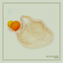 Mesh bag with short handle made of organic cotton