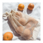 Mesh bag with short handle made of organic cotton